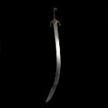 A Persian sword shamshir. Qjar dynasty, broad SE blade 68cms with later Ottoman gold damascened