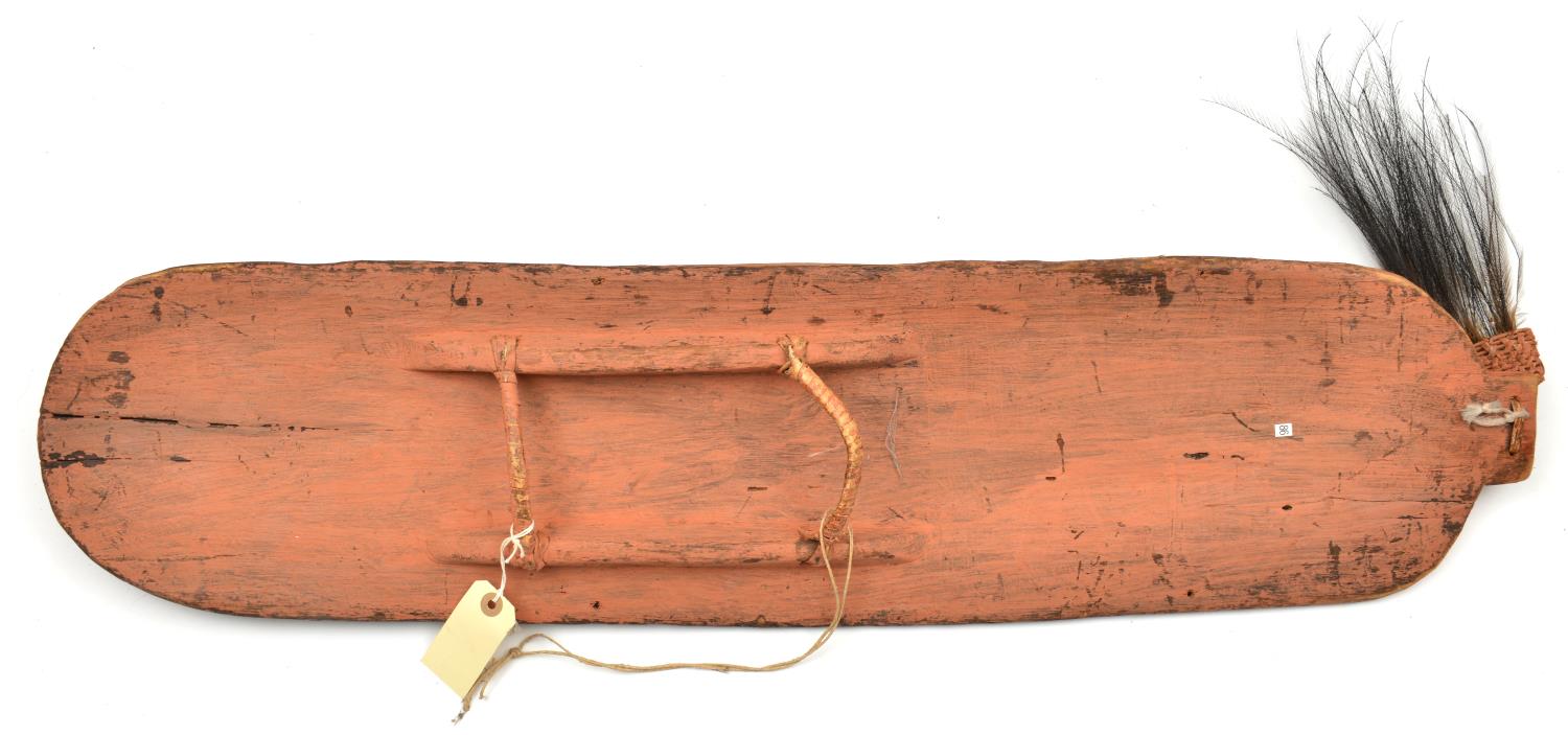 A New Guinea (Sepik river area) wooden shield. Of rectangular form with rounded ends and wicker - Image 2 of 2