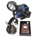 A "Nightsearcher 750" handlamp, battery and charger, with 1000 metre spot beam and secondary work