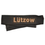 A German 'Lutzow' white on black embroidered cuff title, possibly 1920s Freikorps. GC (slightly