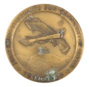 A Third Reich DLV oxidised brass medallion, 60mm diam, the obverse bearing a depiction of a Pflaz