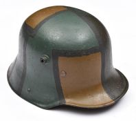 The skull of a 1916 pattern German steel helmet, the inner rim stamped with "K64" size code,
