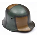 The skull of a 1916 pattern German steel helmet, the inner rim stamped with "K64" size code,