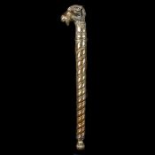 An Indian mace chob. 55cms, made from copper retaining some silver plated finish, embossed with a