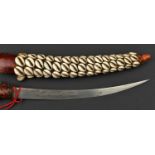 A North African littoral dagger, early 20th century, curved SE blade 26cms engraved and inlaid