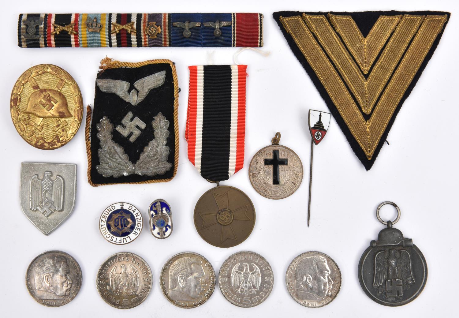 Third Reich medals and insignia: Eastern front medal (no ribbon); War Merit medal with ribbon;