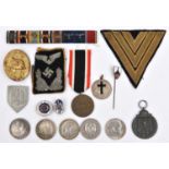 Third Reich medals and insignia: Eastern front medal (no ribbon); War Merit medal with ribbon;