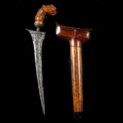 A Malayan dagger kris c.1900. Straight DE etched pamor blade 23cms, wooden hilt carved as a