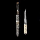 A Tibetan knife, 20th century. Single edge blade 12cms cut with a single fuller, 2 piece bone grips,