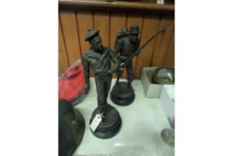 A pair of bronzed hollow spelter figures of 19th century French servicemen: bearded sailor clutching