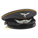 A Third Reich Luftwaffe flight section NCO's peaked cap, with yellow piping, aluminium cockade and