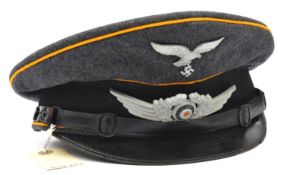 A Third Reich Luftwaffe flight section NCO's peaked cap, with yellow piping, aluminium cockade and