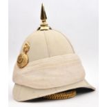 A pre-1881 officer's buff cloth tropical helmet of The 102nd (Royal Madras Fusiliers), white silk
