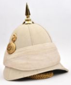 A pre-1881 officer's buff cloth tropical helmet of The 102nd (Royal Madras Fusiliers), white silk