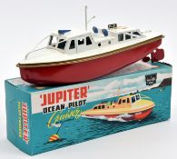 A Sutcliffe clockwork tinplate JUPITER Ocean Pilot boat. In white and red with gold line