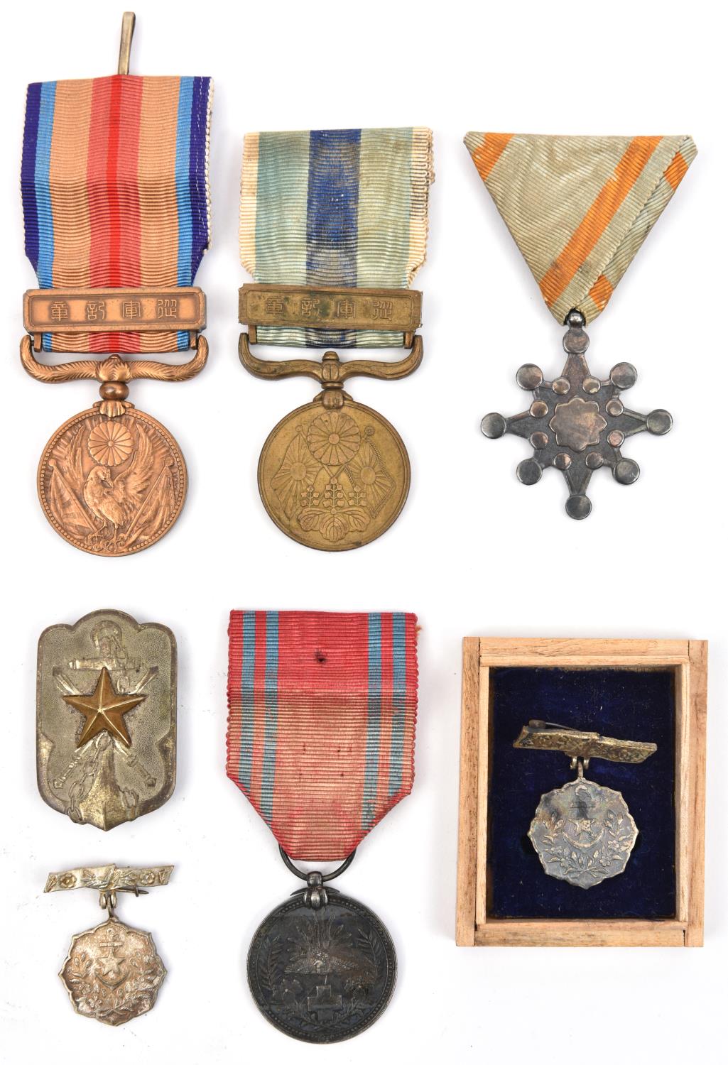 Japan: Order of the Sacred Treasure, 8th class badge in silver; Red Cross medal of Merit; Russo