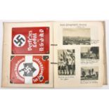 A Third Reich loose leaf scrap album, c 1938-40, containing numerous monochrome pictures cut from