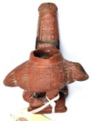 A 19th century American Indian Catlinite pipe bowl, in the form of a beaver (head broken) on a short