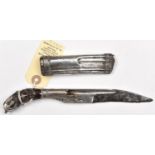 A Sinhalese knife Piha Kaetta, blade 5" with long silver mount finely deeply engraved and pierced