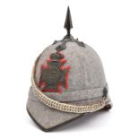 A Vic OR's grey cloth spiked helmet of the Queen's Westminster Volunteers, with blackened top