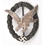 A Third Reich Air Gunner's and Flight Engineer's badge with the colours reversed, which according to