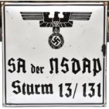 A large Third Reich black on white enamel wall plaque, 18" x 18", bearing eagle and swastika over "