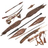 4 various Masai lion spear heads, 29" to 36"; a stabbing spear with flared haft, 45" overall; 4