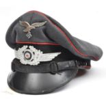 A Third Reich Luftwaffe flak section NCO's peaked cap, the soft top of which droops down at the