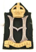An officer's gilt and silver plated cap badge of the 23rd Hussars. VGC Plate 1 .
