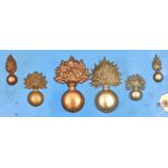 6 plain ball grenade badges: brass large (4½") with loops, cast glengarry size with integral lugs,