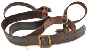 A Third Reich officer's brown leather belt with cross strap, the belt having a brass buckle with