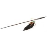 A Zulu throwing spear, slender leaf shaped blade 11", fastened to darkwood haft with twisted steel