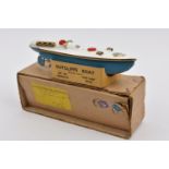 A rare Sutcliffe clockwork tinplate single hull Bluebird boat. In white and light blue with gold