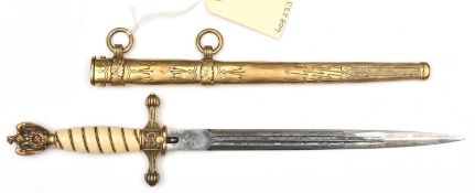 A Third Reich naval officer's dagger, the blade etched with entwined dolphins, fouled anchors, and