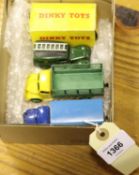 4 Dinky Toys. Dodge Farm Produce Wagon (343) in yellow and green livery, with green wheels.