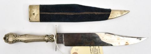 A Victorian Bowie knife, the bright polished blade 8" etched on one side with foliate scrolls and "