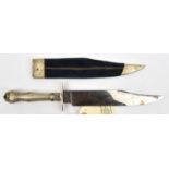 A Victorian Bowie knife, the bright polished blade 8" etched on one side with foliate scrolls and "
