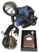 A “Nightsearcher 750” handlamp, battery and charger, with 1000 metre spot beam and secondary work