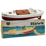 A Sutcliffe clockwork tinplate MINX speed boat/motor launch. In white and red with wooden hatch,