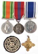 Three: Defence Medal; EIIR Coronation medal (both un-named as issued); Police Long Service medal,