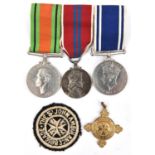 Three: Defence Medal; EIIR Coronation medal (both un-named as issued); Police Long Service medal,