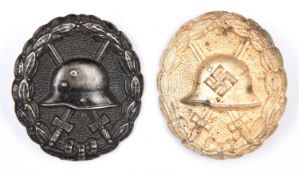 A Third Reich Spanish Civil War pattern Wound Badge in silver, and a WWI pattern Wound Badge in