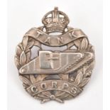 A WM 1st patt cap badge of the Tank Corps, GC (minor wear, lugs replaced) .