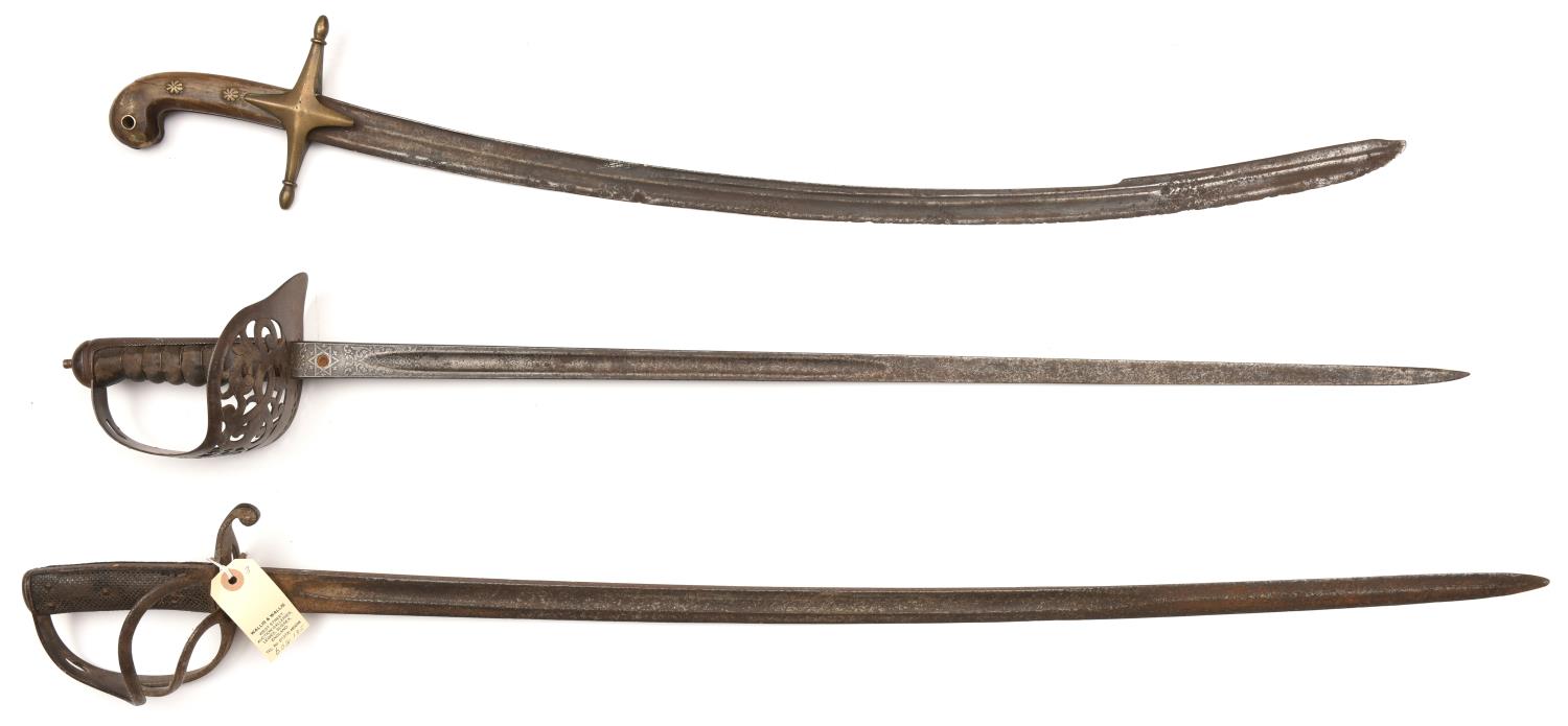 A mameluke hilted sword, blade 29½" with double fullers, the hilt with brass crosspiece and horn