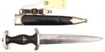 A Third Reich SS dagger, the blade etched with SS runes in circle, "121/34", and RZM mark, the