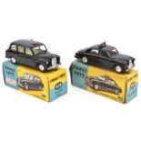 2x Corgi Toys. An Austin Taxi (418). Together with a Riley Pathfinder Police Car (209). Both