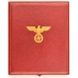 A red leather covered case for the Order of the German Eagle 1st class, the lid impressed with