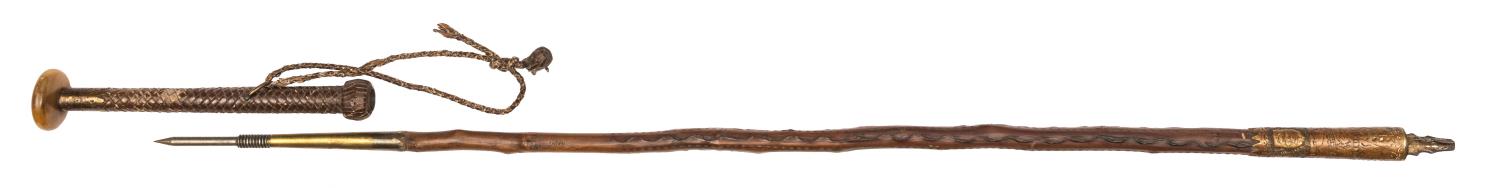 A traditional Basque walking cane Makhila with concealed spike, flattened horn disc pommel in the