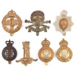 7 cavalry cap badges: ERII bronzed RHG, KDG star, Bays, 7th H (2, one with brooch pin), 11th H and