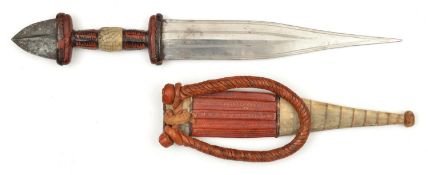 A well made North African tribal dagger, 2nd half of the 20th century, broad DE tapered blade 7½",